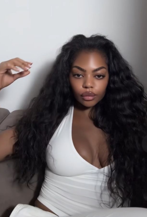 Client wearing Indian Wavy Bundles