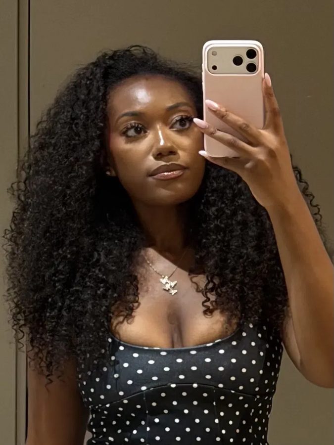 Client wearing the Burmese Curly Half Wig